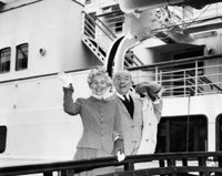 Portrait of Senior Couple Waving from Cruise Ship Poster Print