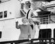 Portrait of Senior Couple Waving from Cruise Ship Poster Print
