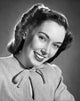 Portrait of a young woman smiling poster print, vibrant artwork for home decor.