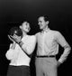 Young man and woman holding a bowling ball poster print