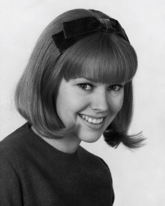 Portrait of a teenage girl smiling poster print showcasing joy and happiness.