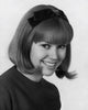 Portrait of a teenage girl smiling poster print showcasing joy and happiness.