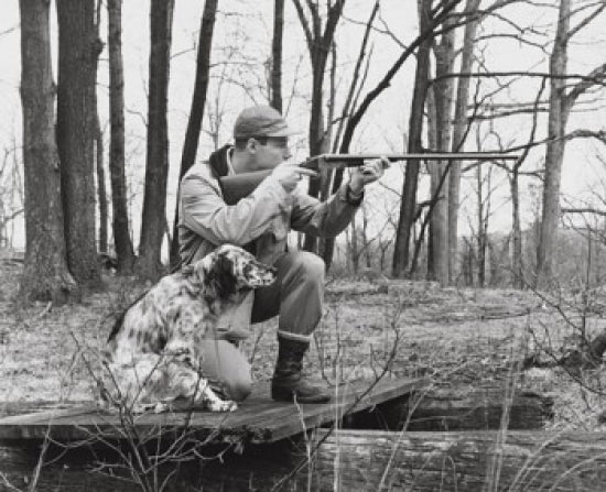 Male Hunter Aiming with Rifle Poster Print on high-quality paper.