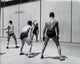 Four People Playing Handball Poster Print showcasing dynamic athleticism.