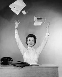 Businesswoman throwing papers poster print showcasing dynamic office energy.