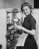Portrait of a Young Woman Pouring Milk into a Glass Poster Print
