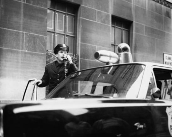 Police Officer Using a Telephone Poster Print