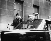 Police Officer Using a Telephone Poster Print