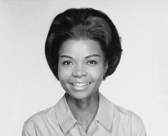 Portrait of a mature woman smiling poster print