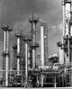 Smoke Stack at Murphy Oil Refinery Poster Print featuring an industrial landscape