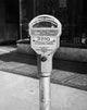 Close-up of a coin operated parking meter poster print.