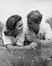 Close-up view of a young couple lying in a park poster print.