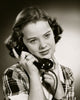 Close-up poster print of a teenage girl talking on the telephone
