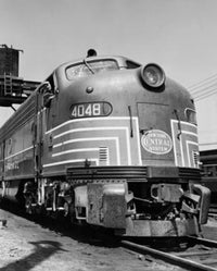 Train on a Railroad Track Poster Print showcasing a scenic view.