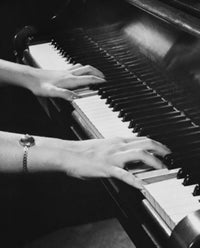 High angle view of hands playing the piano poster print
