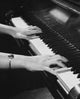High angle view of hands playing the piano poster print