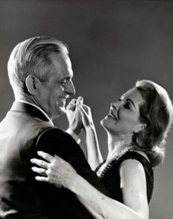 Side profile artwork of a senior couple dancing, capturing love and joy.