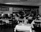 People in Restaurant Poster Print showcasing lively dining scene.