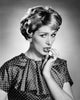 Portrait of young woman biting her nails poster print