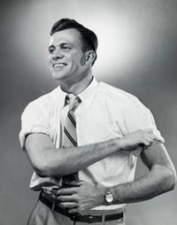 Close-up of a businessman rolling up his sleeves poster print