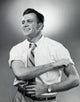 Close-up of a businessman rolling up his sleeves poster print
