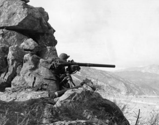 Korea War Soldier Poster Print - US Army soldier holding weapon on hillside during the 1950s
