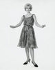 Portrait of a young woman with arms outstretched poster print.