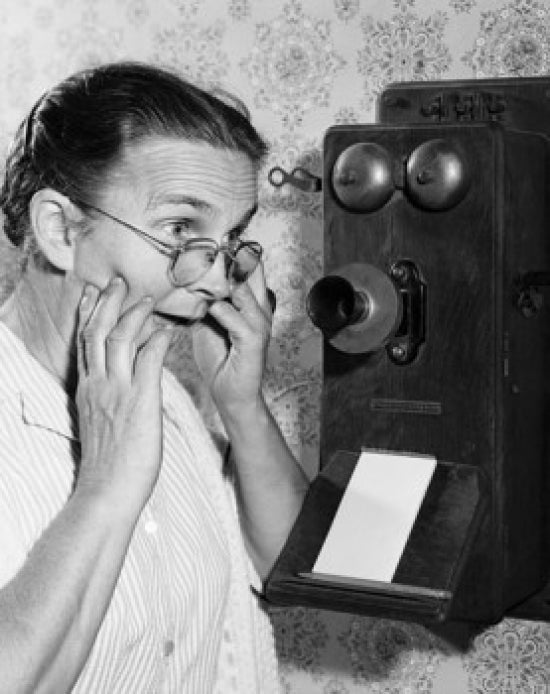 Close-up of a senior woman talking on the telephone poster print.