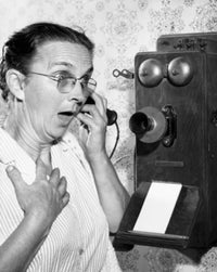 Close-up poster print of a senior woman talking on the telephone