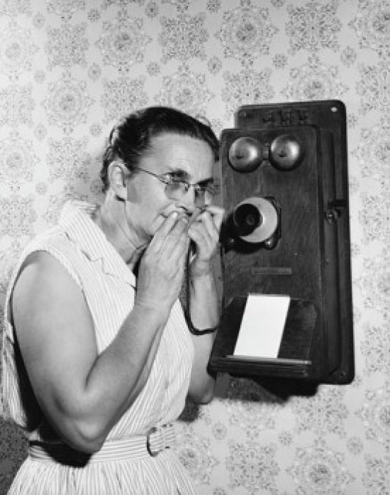 Senior woman talking on the telephone Poster Print