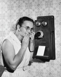 Senior woman talking on the telephone Poster Print