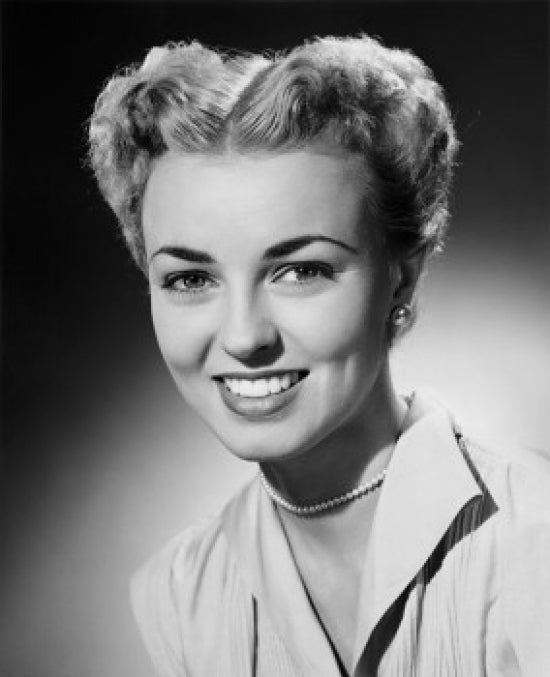 Portrait of a Young Woman Smiling Poster Print showcasing joy and warmth.