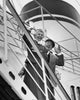 Portrait of a senior couple waving from a ship, poster print.