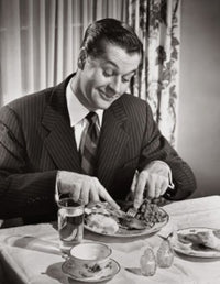 High angle view of a businessman enjoying a meal poster print.