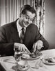 High angle view of a businessman enjoying a meal poster print.