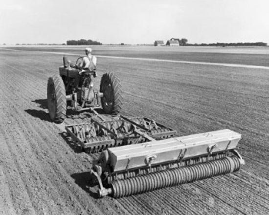 Poster print featuring a farmer sowing alfalfa and ladino clover seeds in a field.