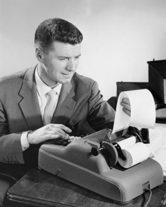 Businessman Using an Adding Machine Poster Print