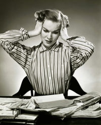 Close-up poster print of a businesswoman suffering from a headache.