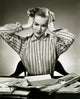 Close-up poster print of a businesswoman suffering from a headache.