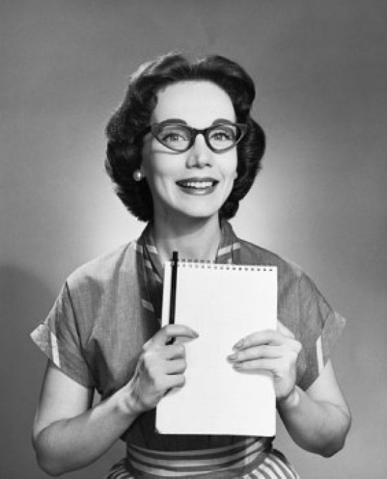 Portrait of a young woman holding a notepad and pencil poster print