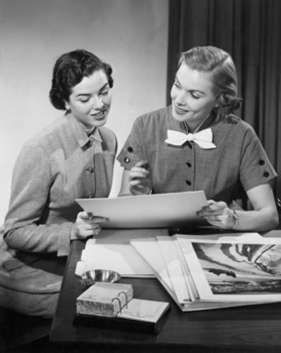 Poster print of two businesswomen admiring art in a gallery setting.