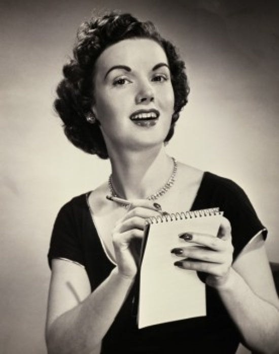 Portrait of a young woman writing on a notepad poster print.