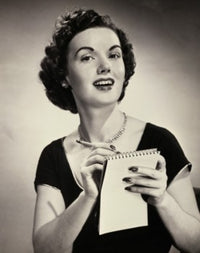 Portrait of a young woman writing on a notepad poster print.