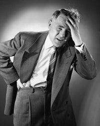 Mature Man Suffering from a Headache Poster Print showcasing deep emotion.
