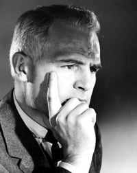 Close-up poster print of a serious businessman, ideal for office decor.