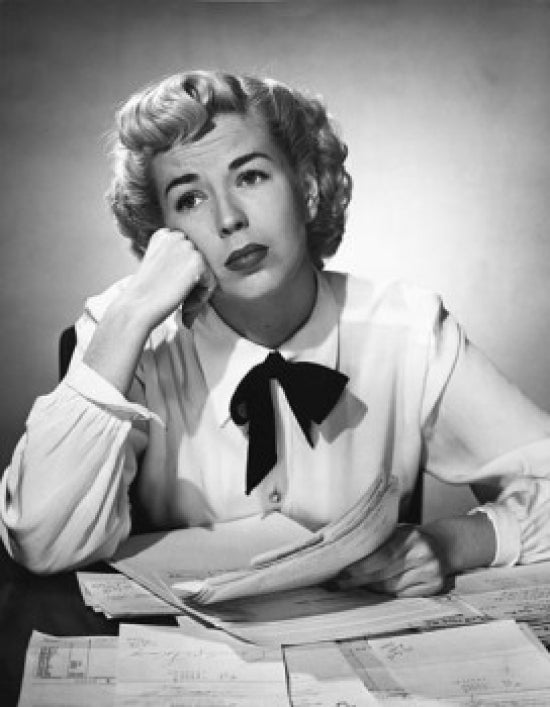 Close-up of a businesswoman deep in thought poster print.