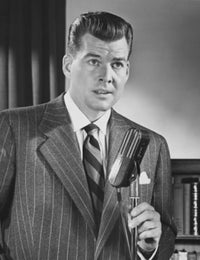 Businessman Speaking into a Microphone Poster Print