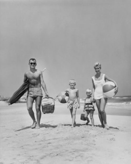 Parents walking on beach poster print capturing family joy and togetherness.