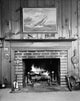 Fireplace in a Room Poster Print showcasing a cozy ambiance.