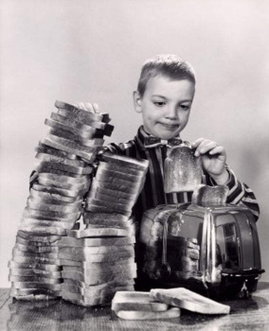 Boy Making Toast Poster Print on premium heavy stock paper